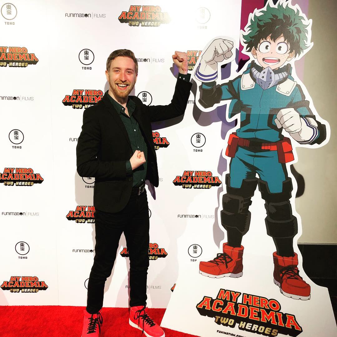 Justin-Briner-with-his-character-Izuku-Midoriya-cardboard-cutout