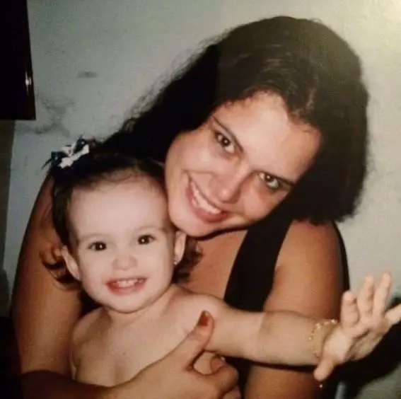 Young Barbie Ferreria with her mother
